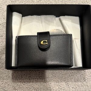 Coach Black Leather Wallet with Gold Accent